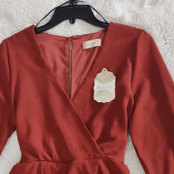 Altar'd State Rust Long Sleeve Peplum Jumpsuit. - Picture 11 of 17